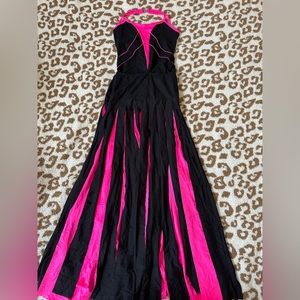 Black and hot pink lyrical leotard and skirt. Size adult small.